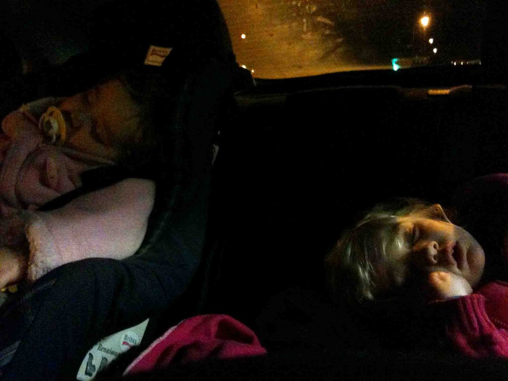 kids sleeping in car