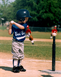 boy playing tball