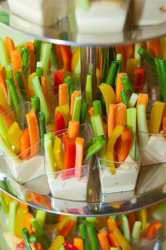 sliced vegetables in cup with ranch in the bottom