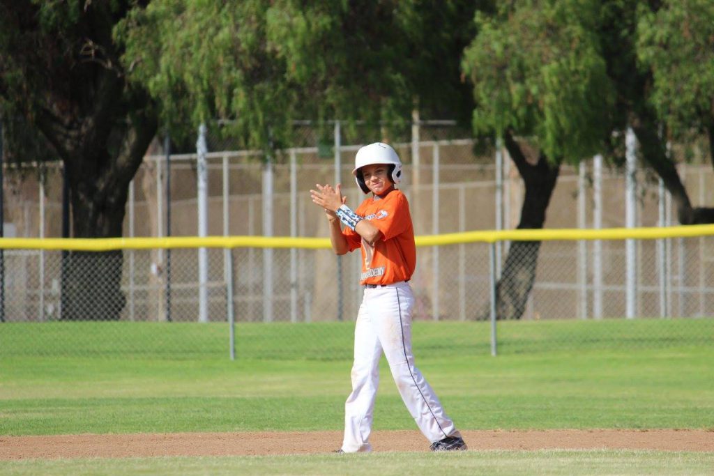 youth pitcher throwing