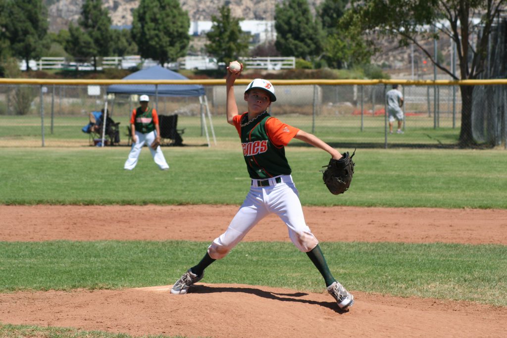 youth pitcher throwing