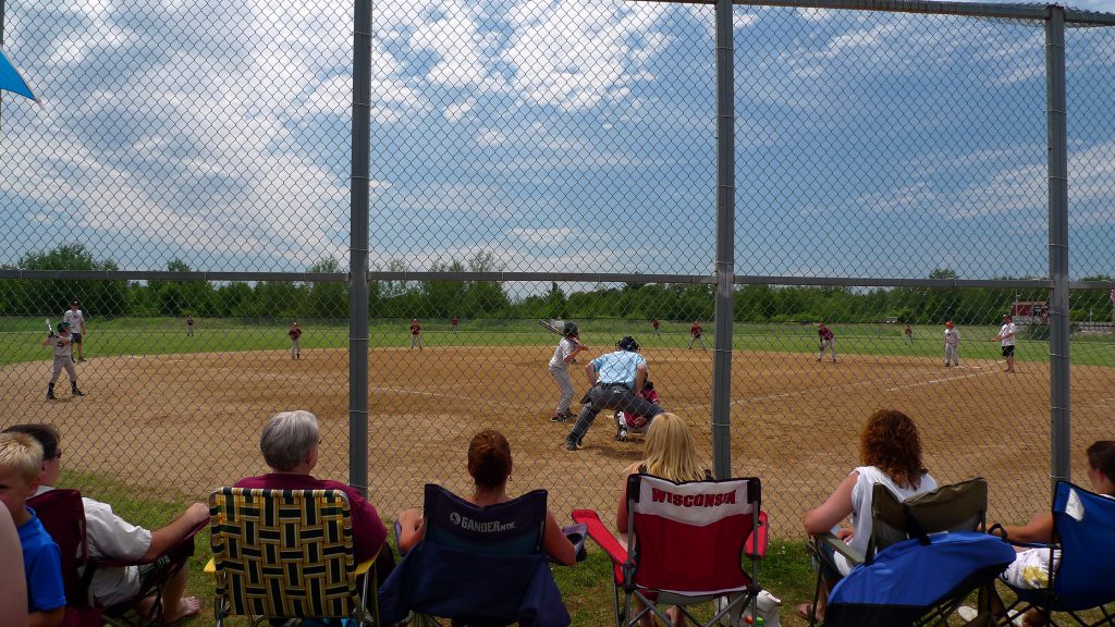 parents behind umpire