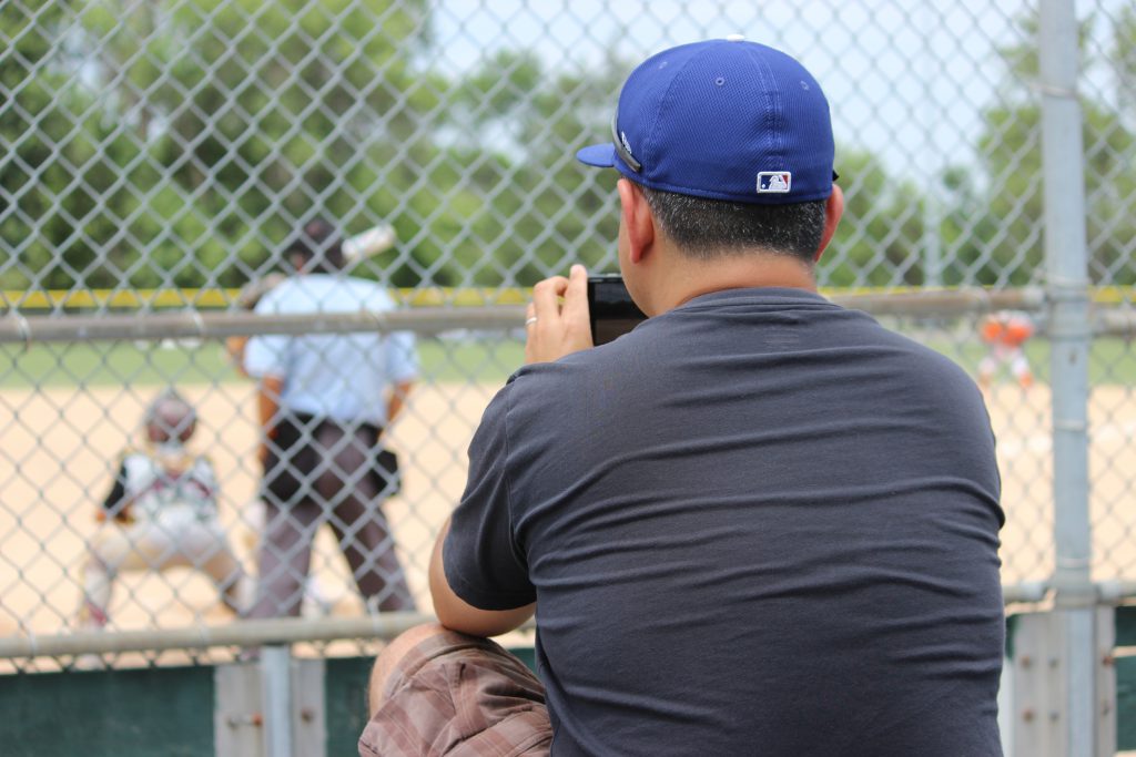 dad watching baseball