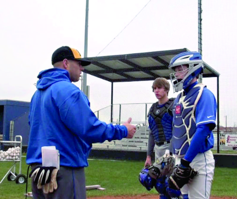 coach talking to players