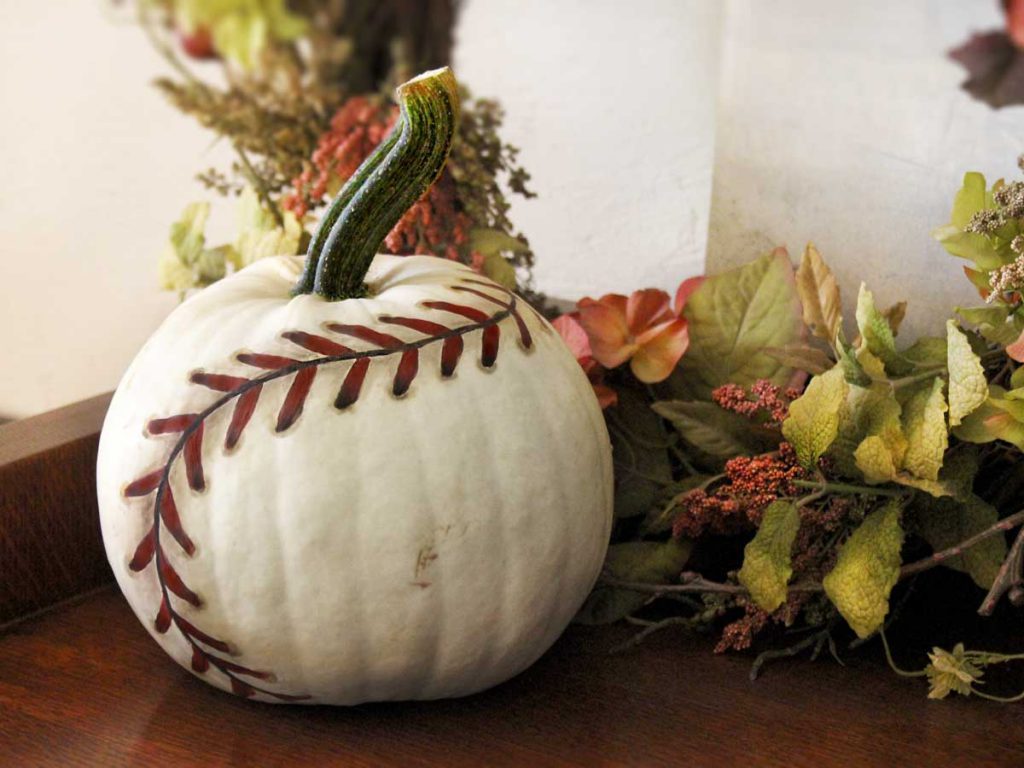 white painted baseball pumpkin