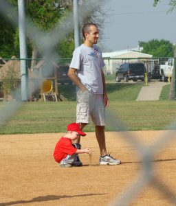 playing with dirt on the baseball field