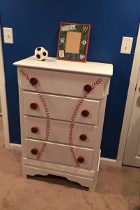 baseball dresser with round knobs