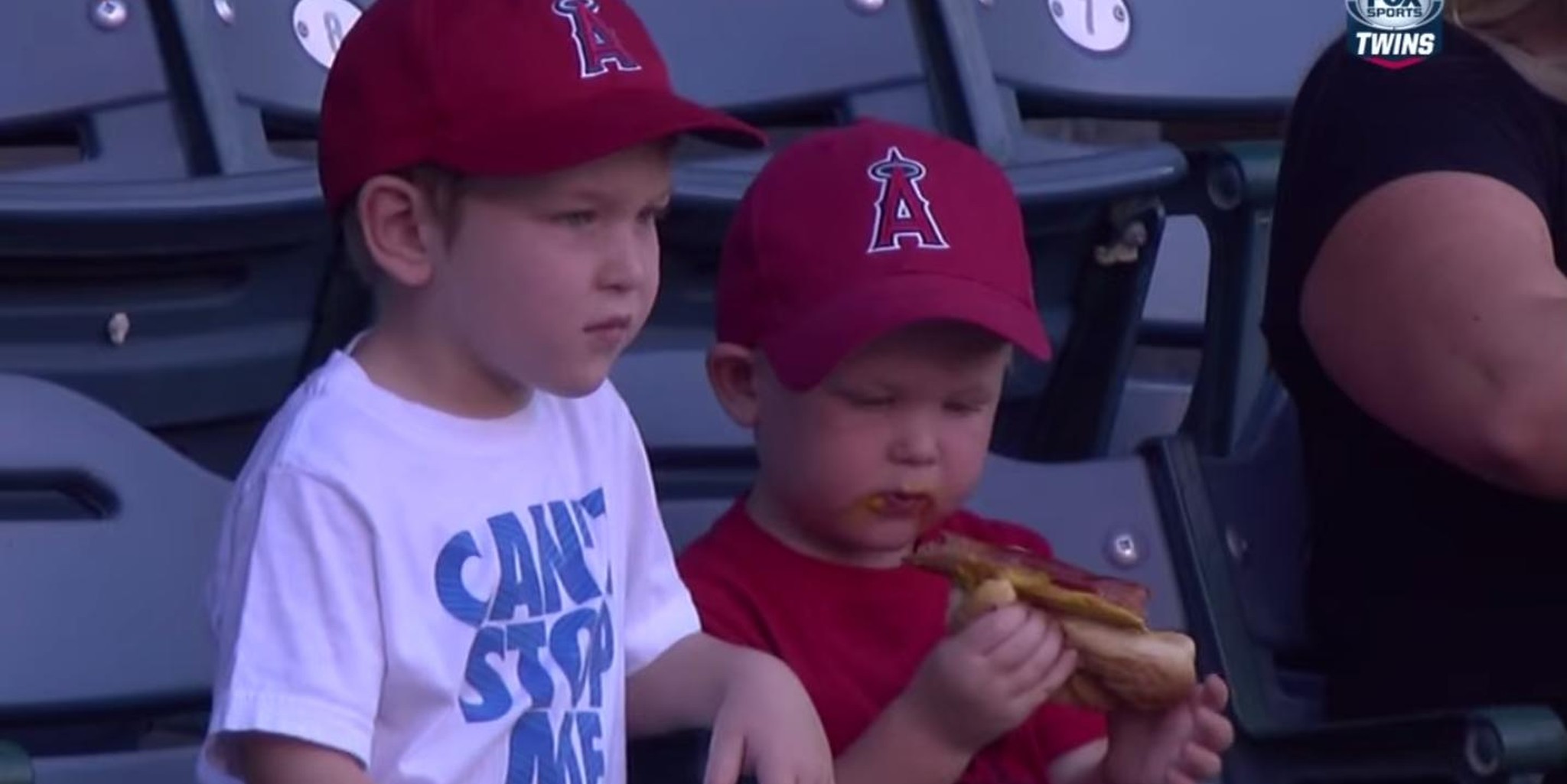 kid with escaping hot dog