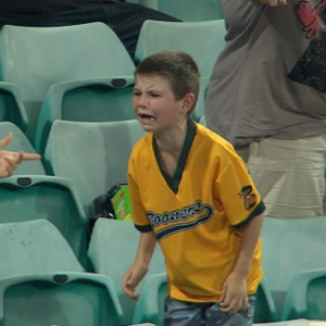 boy crying at baseball game