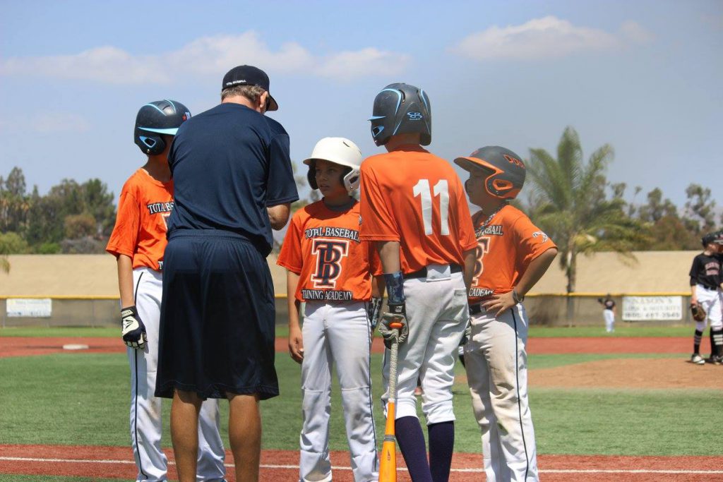 coach talking to players