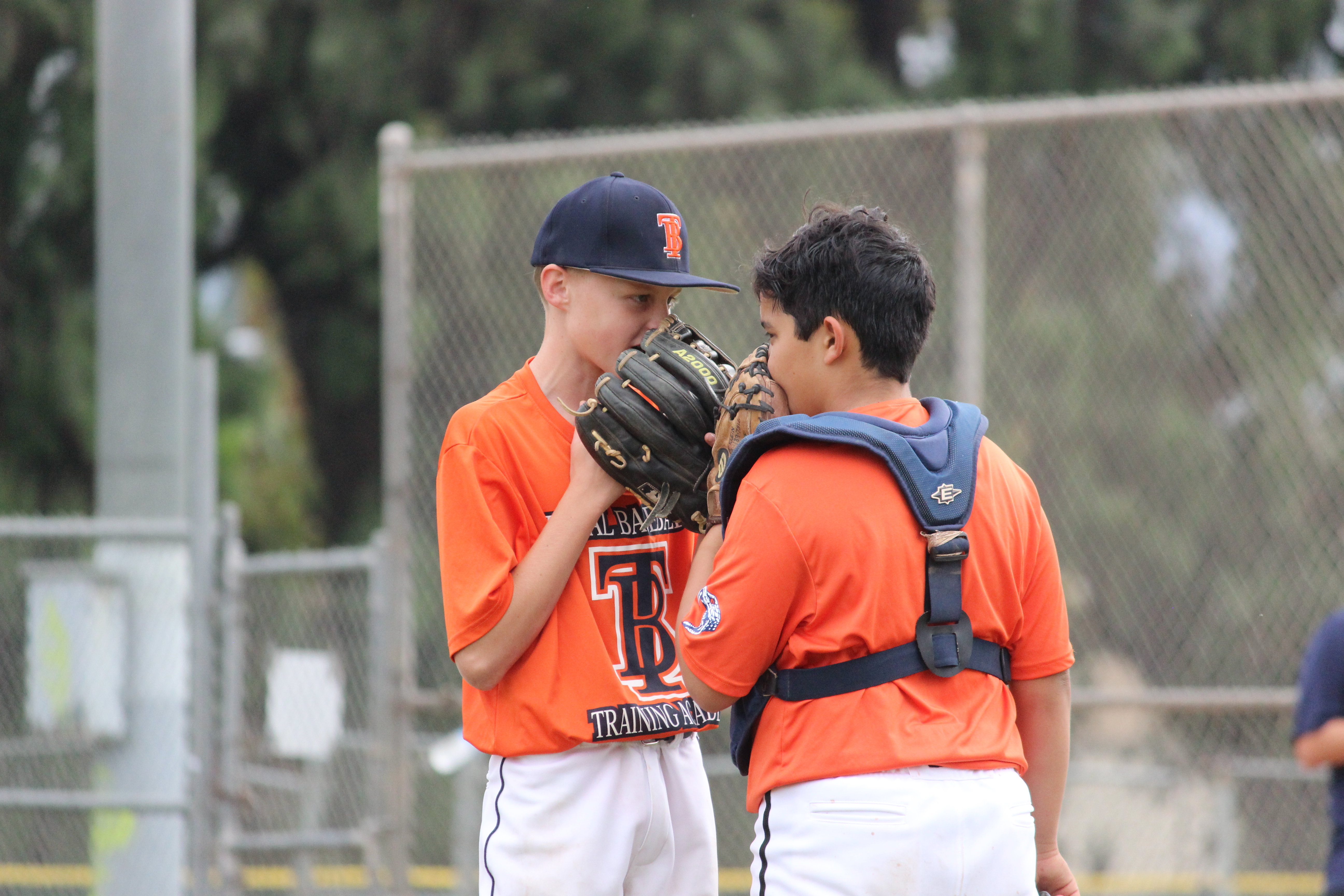 pitcher catcher meeting on the mound