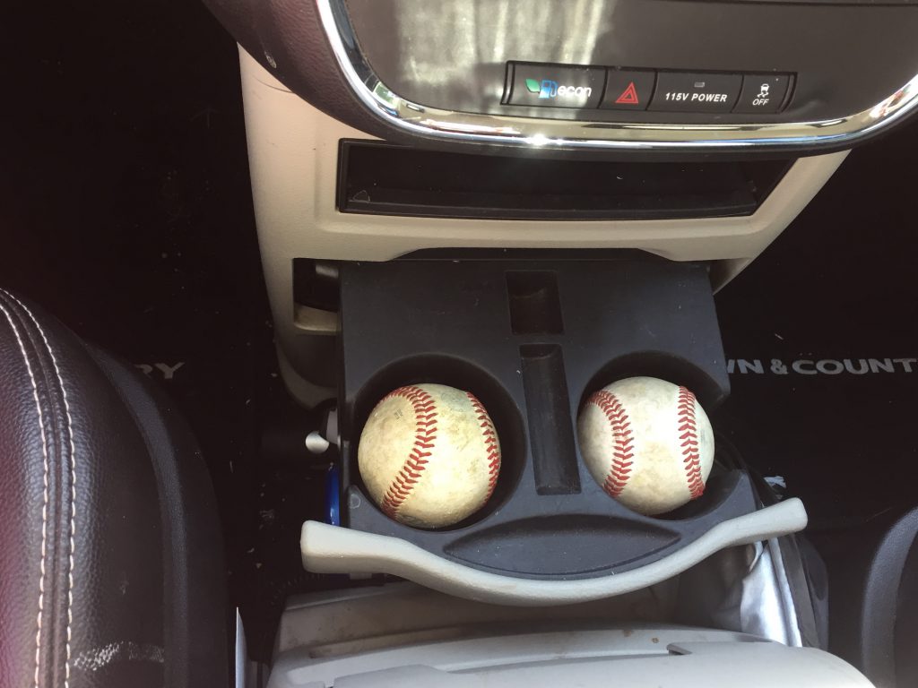 baseballs in cupholder
