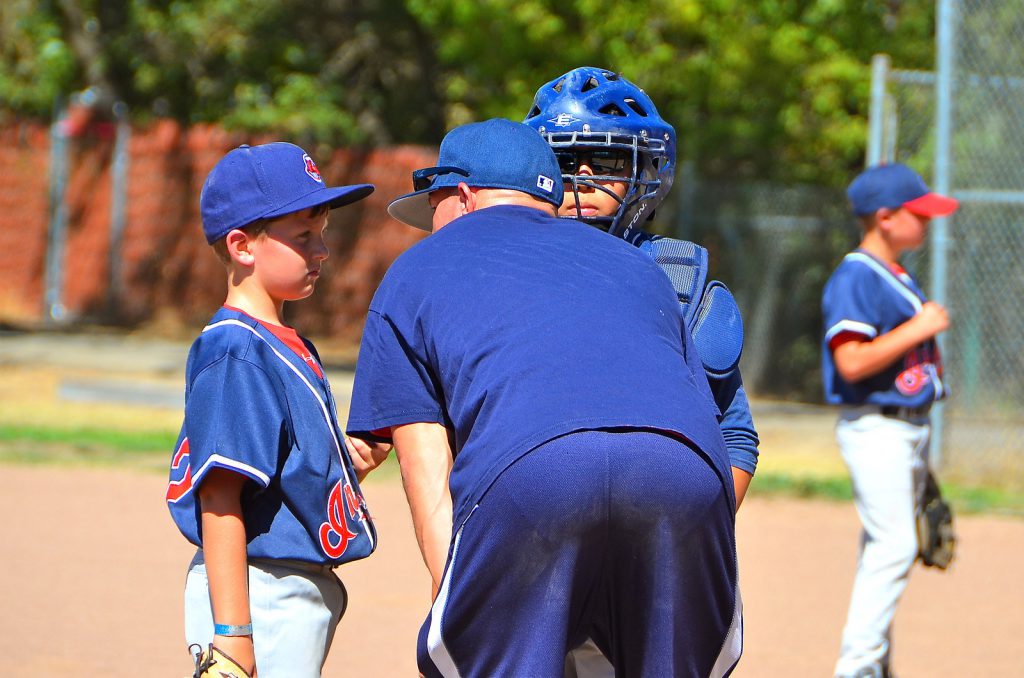 coach talking to players