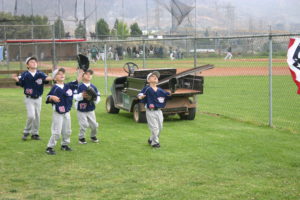 baseball boys catching fly balls