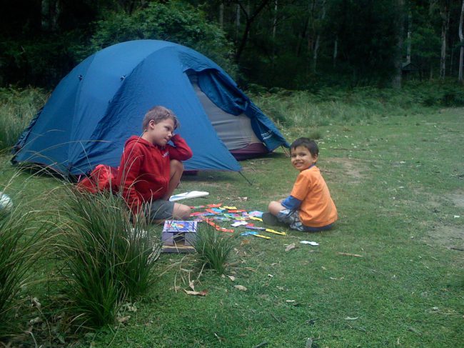 little boys near a tent