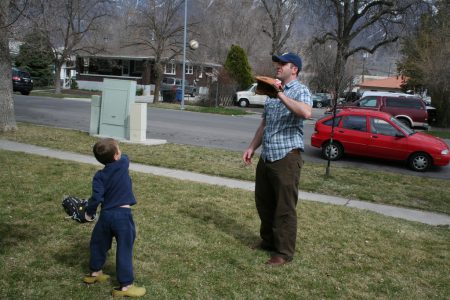 father and son playing catch