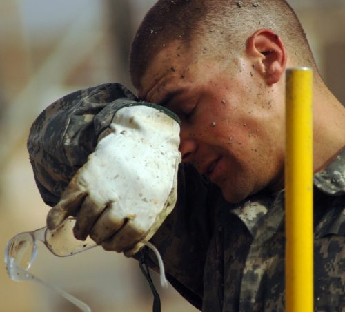 male worker sweating