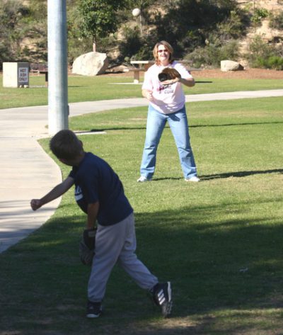 mom and son playing catch