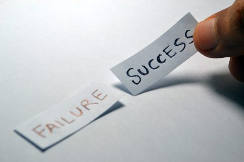 failure and success written on paper